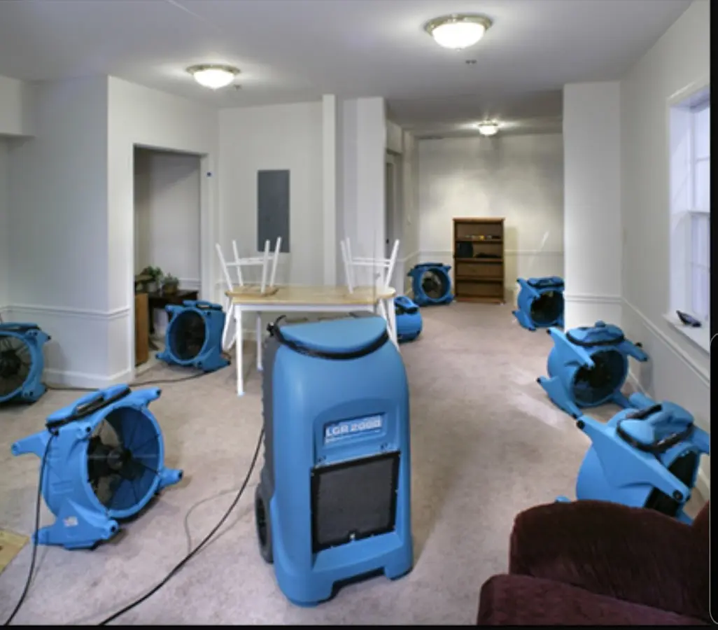 Air movers and dehumidifier setup for Water Damage Restoration in Knightdale